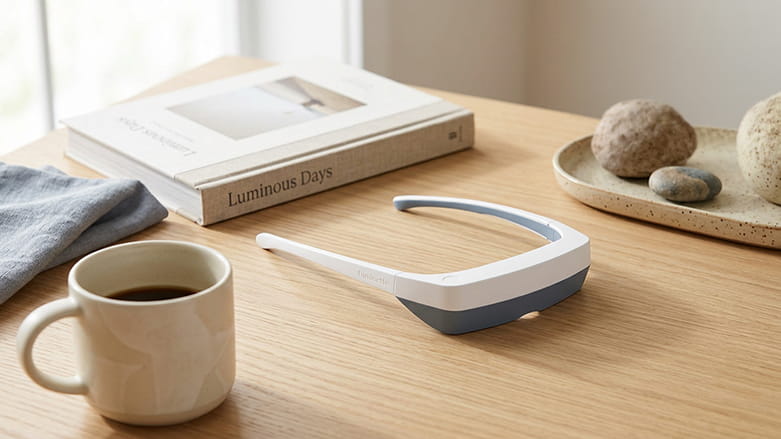 Luminette glasses next to everyday items