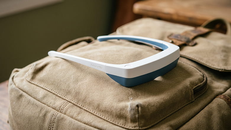 Luminette glasses on a travel backpack