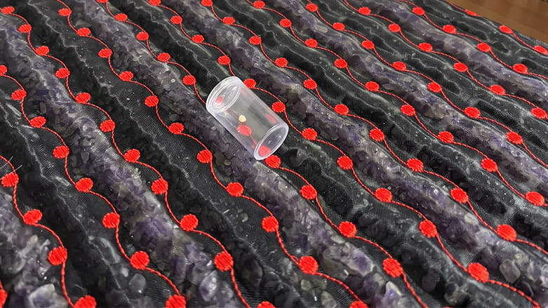 Plastic tube on PEMF mat