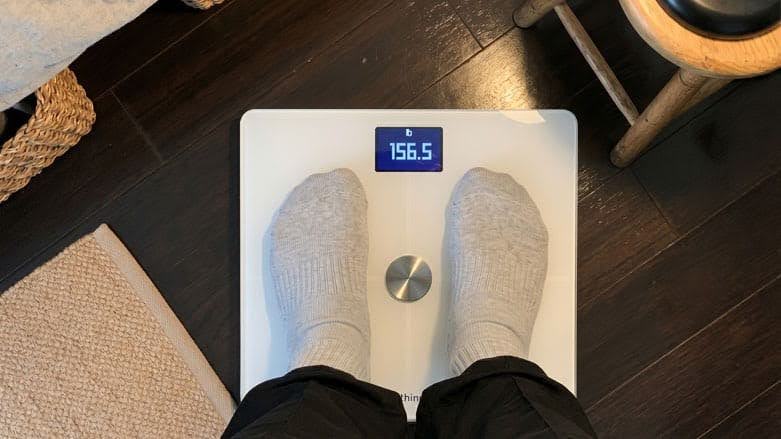A person standing on Withings Body Smart