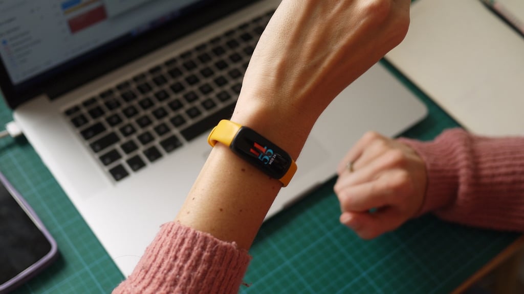 fitbit on woman's wrist