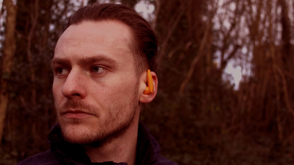 man wearing beats powerbeats pro 2