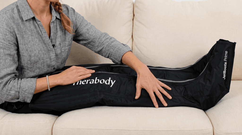 Therabody compression boots in use