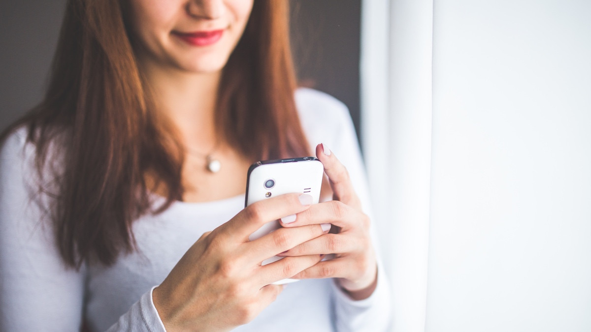 Smart earbud lets you control your phone with just a smile