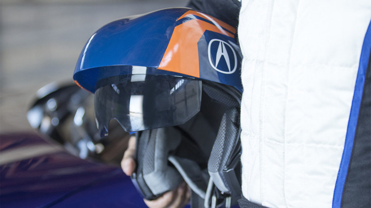 You can watch Acura demo its augmented reality racing helmet - in a real race