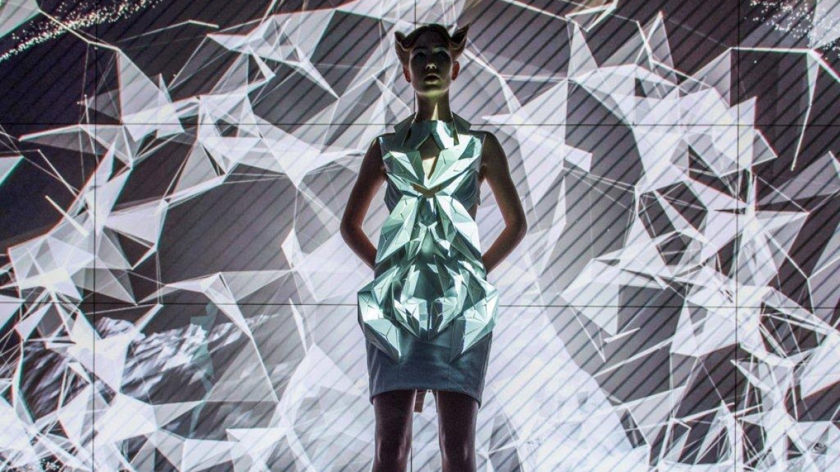 These futuristic smart dresses use Audi car parts to patrol personal space
