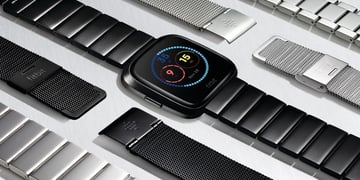 You can now board your flight and pay for Starbucks with Fitbit smartwatches
