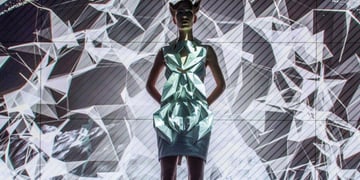 These futuristic smart dresses use Audi car parts to patrol personal space