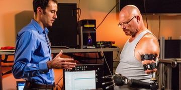 This man's prosthetic arm is gesture controlled with a Myo armband